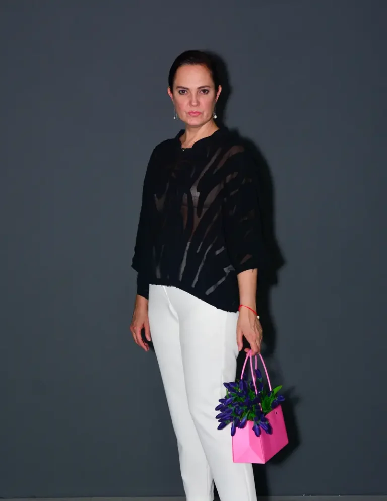 a middle-aged woman in a gray room — BLISS Magazine | The July Fashion & Beauty Edition | Vol.5 | 2023